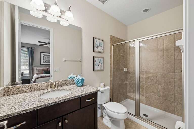 Bathroom with glass enclosed shower