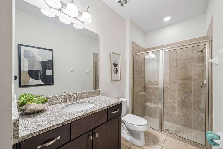 Bathroom with glass enclosed shower