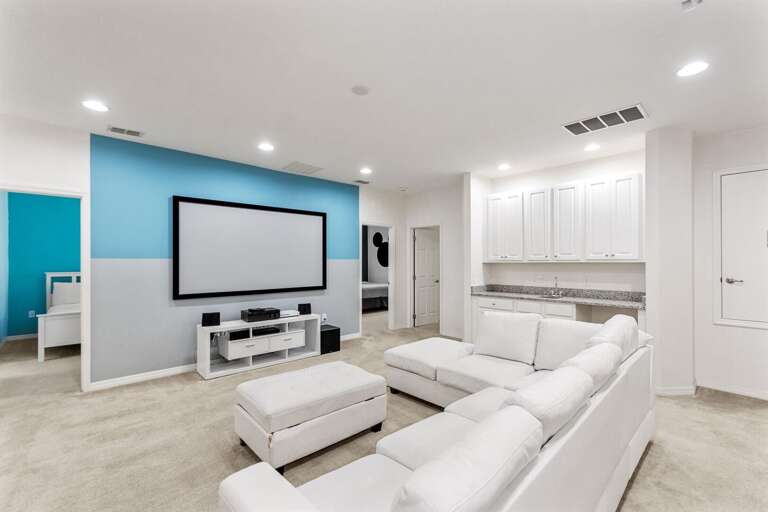 Entertainment  Area w/ Large Screen and Sectional Sofa