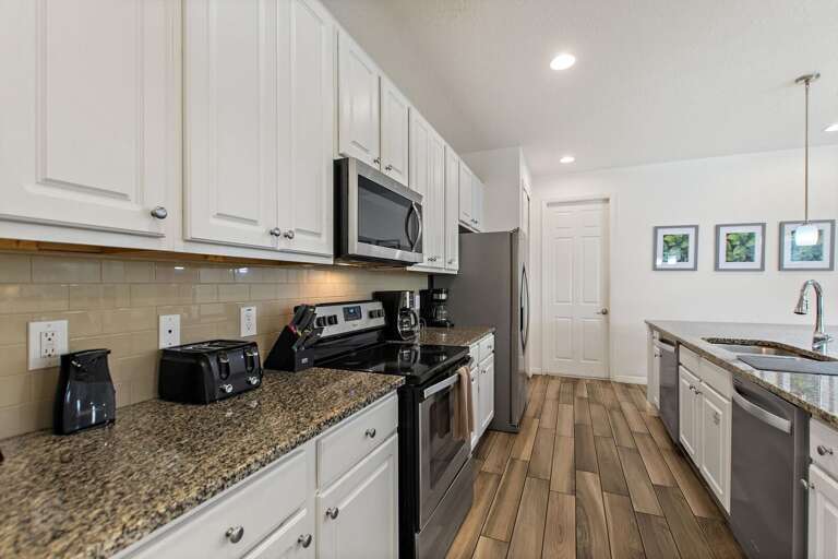Kitchen Area w/ Stainless-steel Appliances