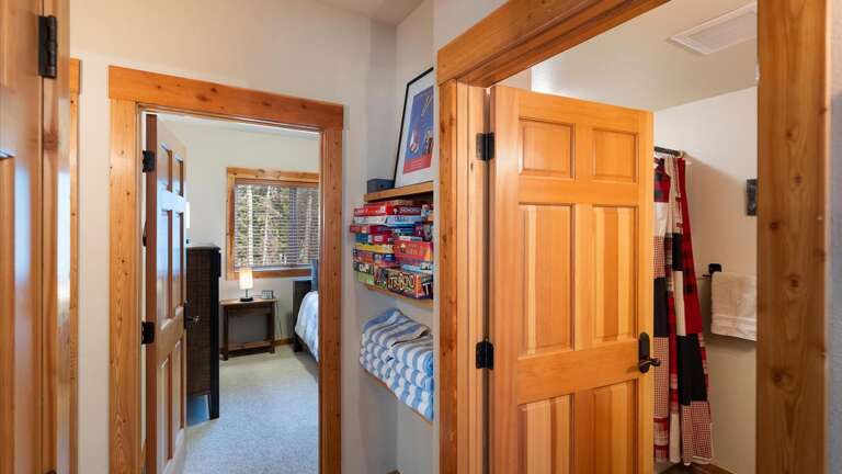 Hallway into the bathrooma and bunk room