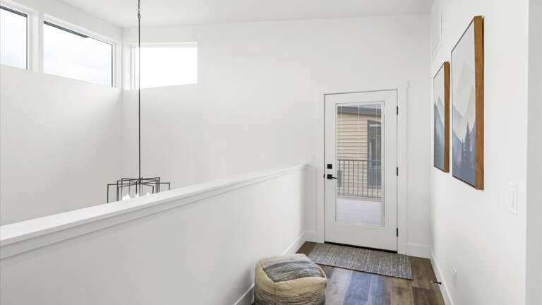 The upstairs loft leads out to the giant patio.
