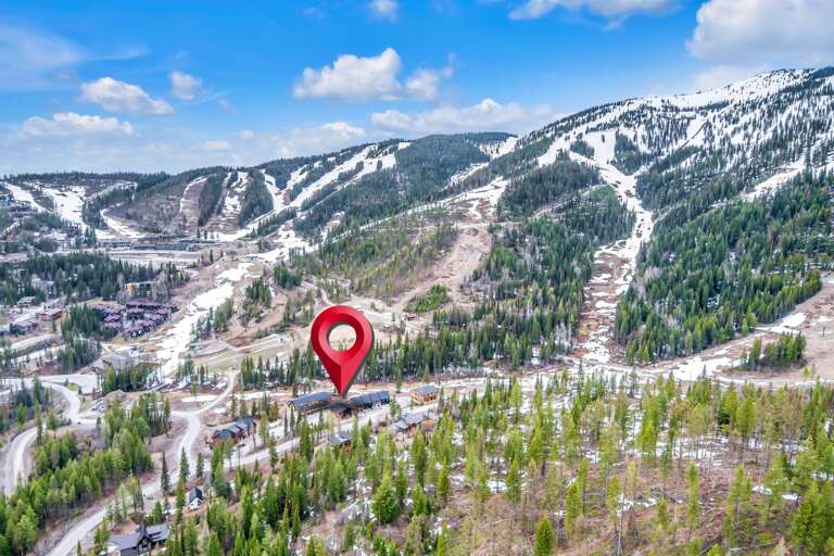 Aerial view of The Glades Chalet at Inspiration Loop showcasing the location on Whitefish Mountain Resort.