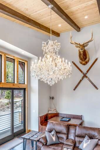 Luxury custom chandelier that provides tranquil lighting and mountain modern elegance.