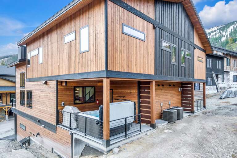 Step onto the back deck and relax in the state of the art hot tub or BBQ on a top of the line gas grill (propane provided).
