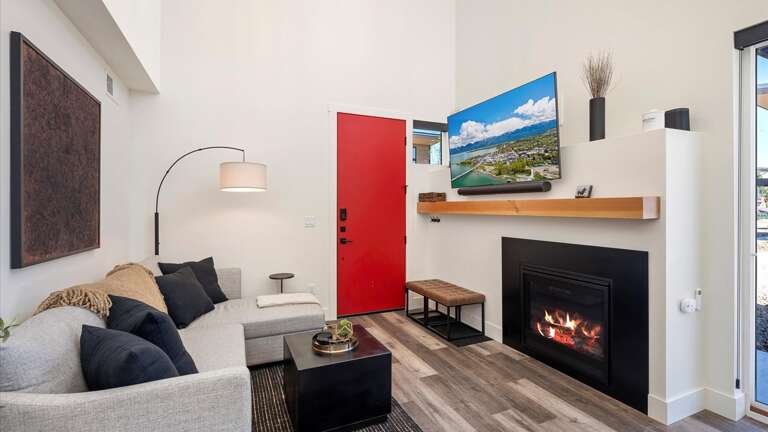 The living room features a luxury queen sofa sleeper to accomodate additonal guests.