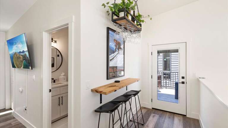 The upstairs loft features desk space for our work from home guests, as well as additional bar and glassware.