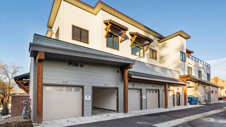 Designated heated parking garage suitable for mid-size SUVs or smaller.