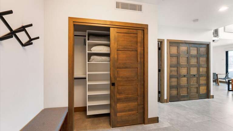 Large storage closet spacious enough for all of your summer or winter gear.