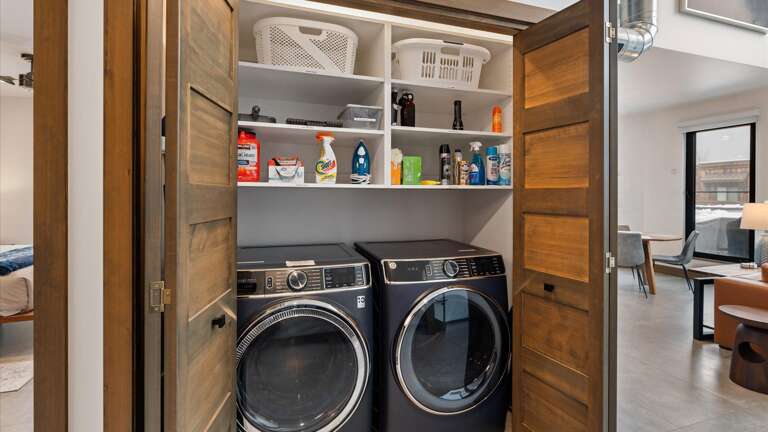 Laundry area with top-of-the-line washer and dryer