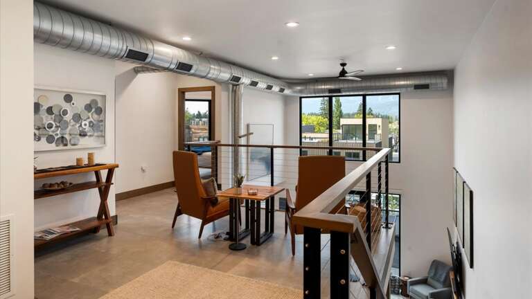 Open loft seating area with views of Big Mountain (Whitefish Mountain Resort)