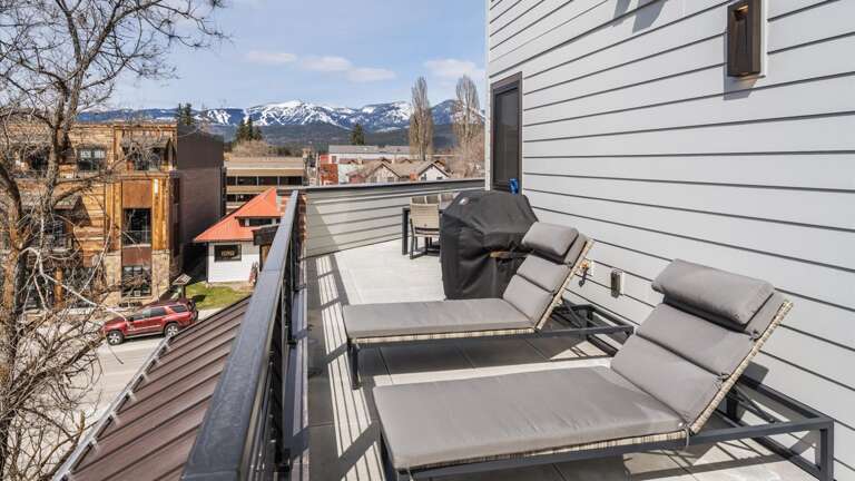Wrap around balcony with brand new hot tub, BBQ grill, luxury patio seating and loungers,  outdoor dining table for 8, 360 alpine views