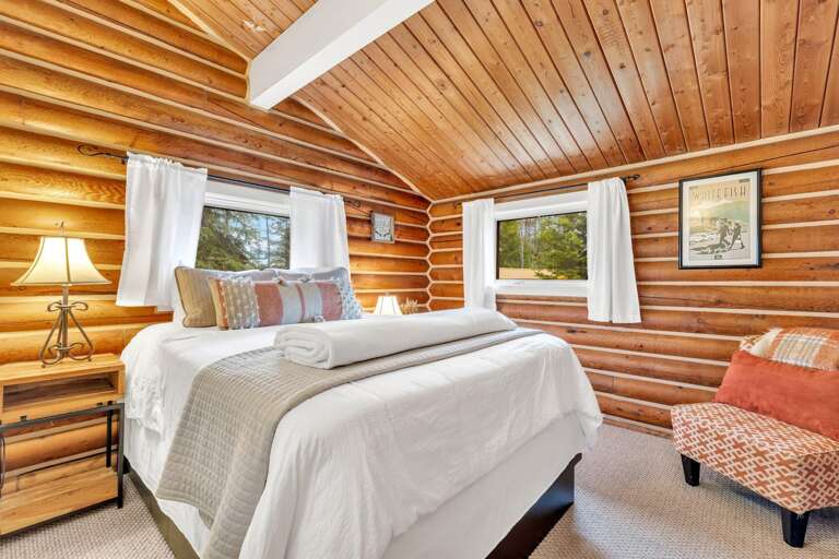 The Master bedroom with luxury queen mattress, large closet, luxury linens and vaulted ceilings