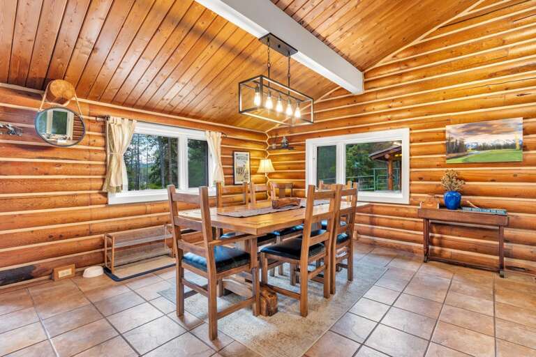 The open concept dining area with seating for 8