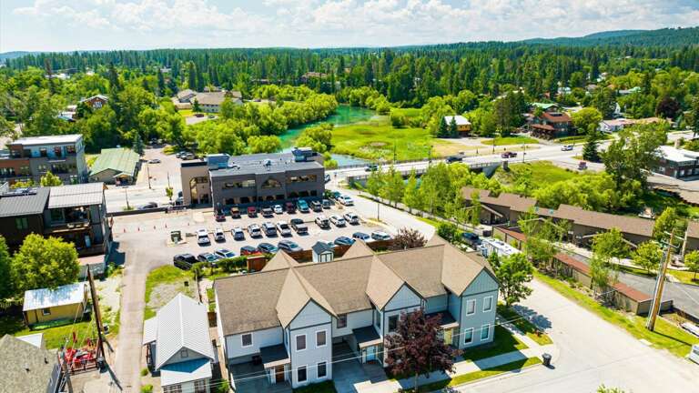 Aerial view of the property showcasing the location in the heart of downtown and river access