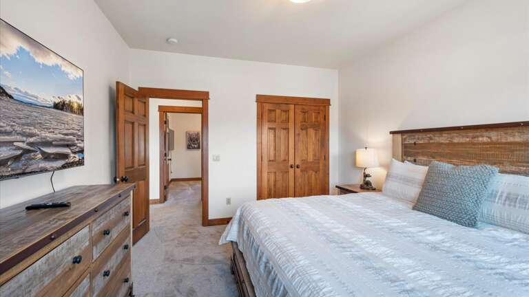 The king guest room features a luxury mattress and linens, dresser, HDTV with streaming capabilities, large clsoet.