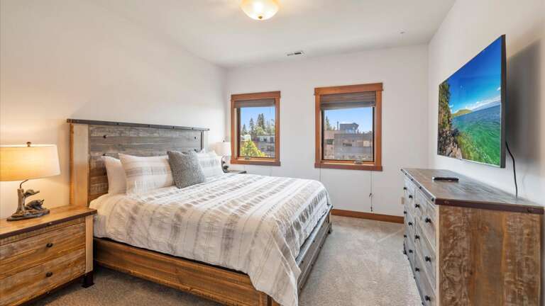 The king guest room features a luxury mattress and linens, dresser, HDTV with streaming capabilities, large clsoet.