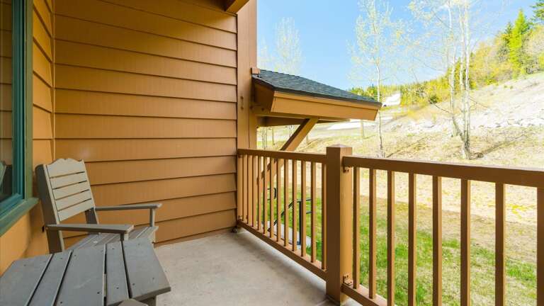 Balcony seating with views of the slopes and the skiers passing by.