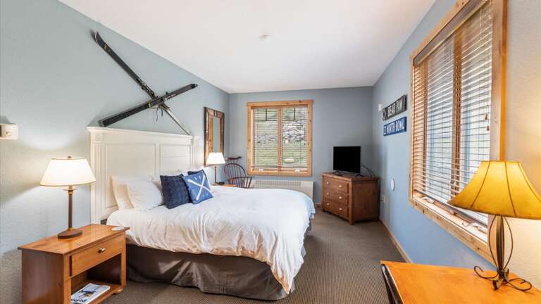 Master bedroom with alpine views from the luxury king size bed! HDTV with streaming capabilities, large closet, desk and chair to accommodate our work from home guests, and ensuite bathroom.