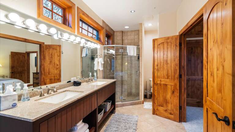 Junior Master Ensuite Bathroom: Jetted tub, double vanity, grand shower, and private toilet