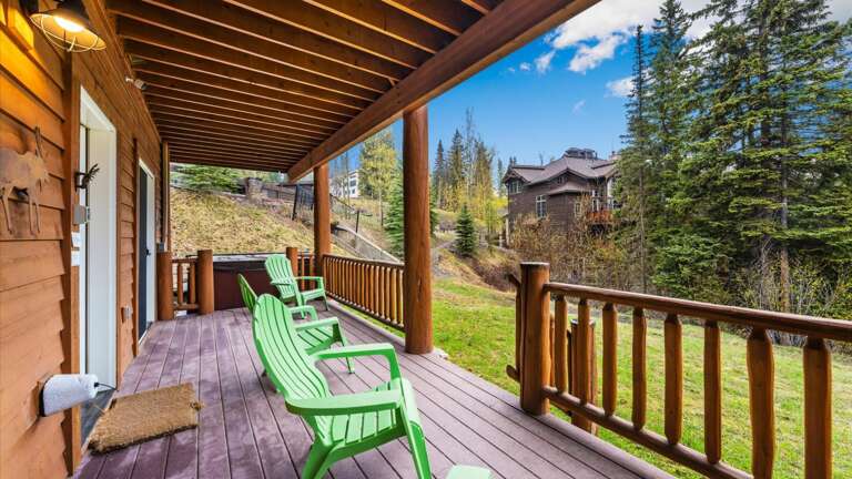Lower level deck with ski access right off the deck and private hot tub.