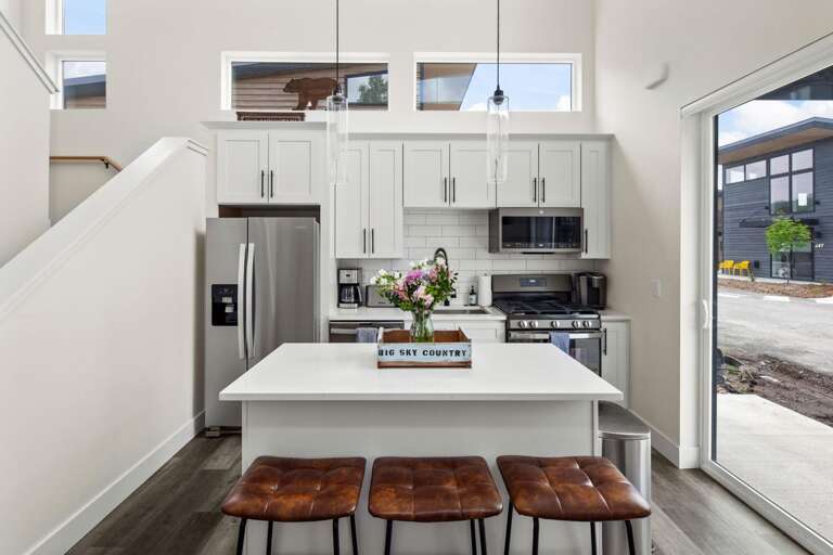 Fully stocked kitchen with both a drip pot coffee maker and keurig.