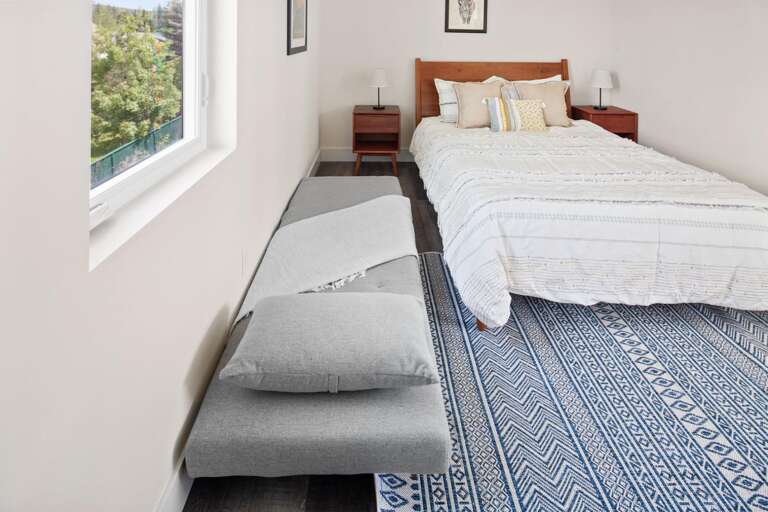 The sofa chair pulled out to a twin bed.