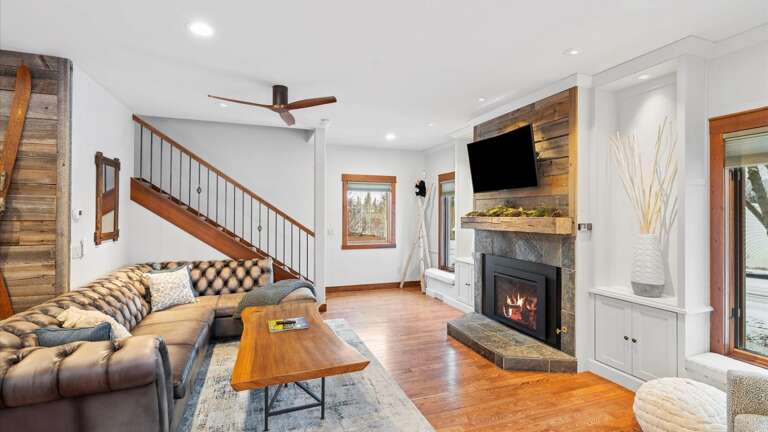 Enter through the doors of The Dancing Bears Den and be greated by a warm fire and a plush sofa to relax after a long day of adventures.