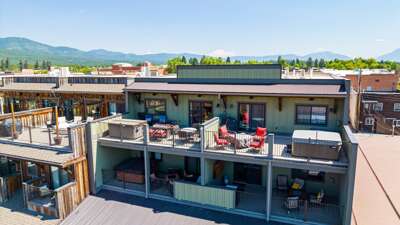 Aerial view of the property with the large deck.