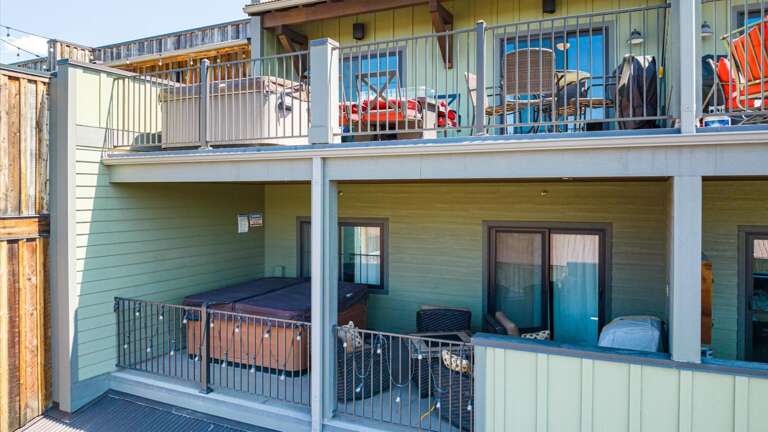 Aerial view of the property with the large deck.
