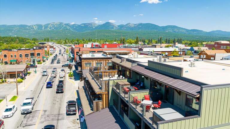 Aerial view of the property with the large deck.