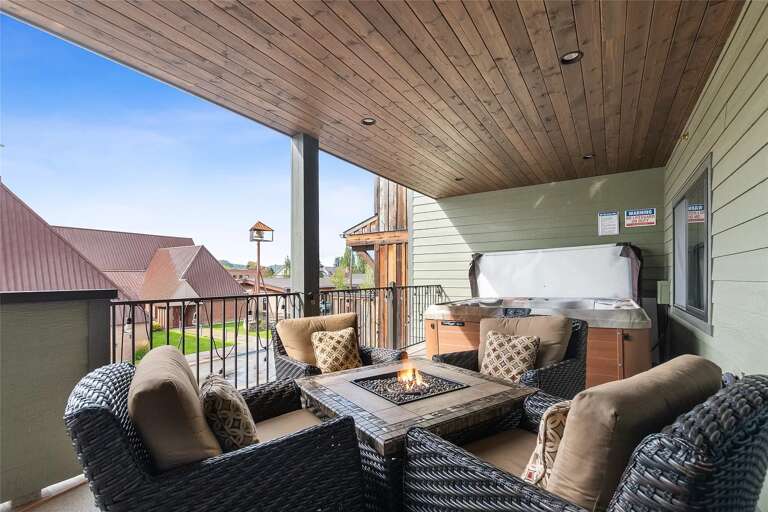 Enjoy one of the few downtown properties that has a large private deck with a state of the art hot tub, gas firepit, seating area, and gas grill.