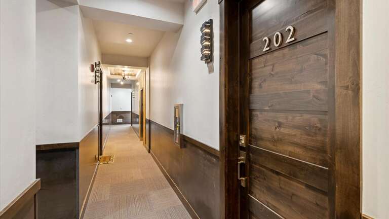 Hallway to unit (elevator up to 2nd floor or stairs)