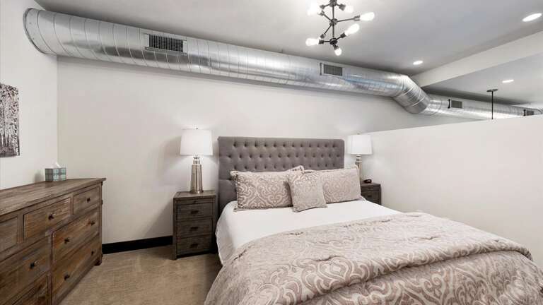 Master bedroom with luxury king mattress and luxury linens.