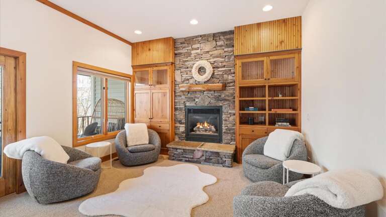 Living room area with gas fireplace (not pictured: large sectional couch