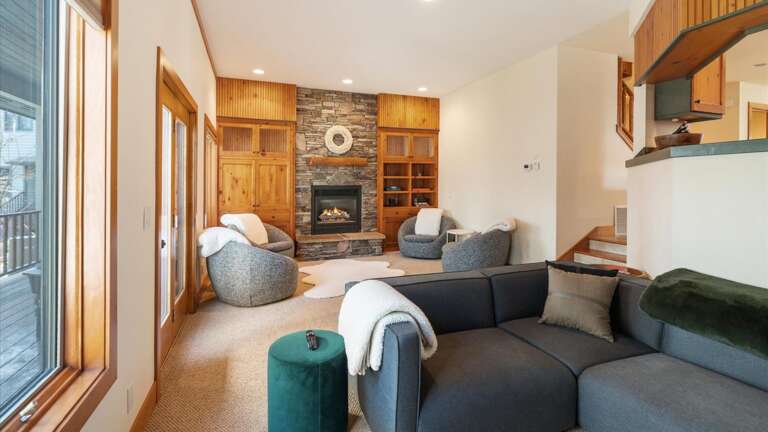 Living room area with gas fireplace (not pictured: large sectional couch