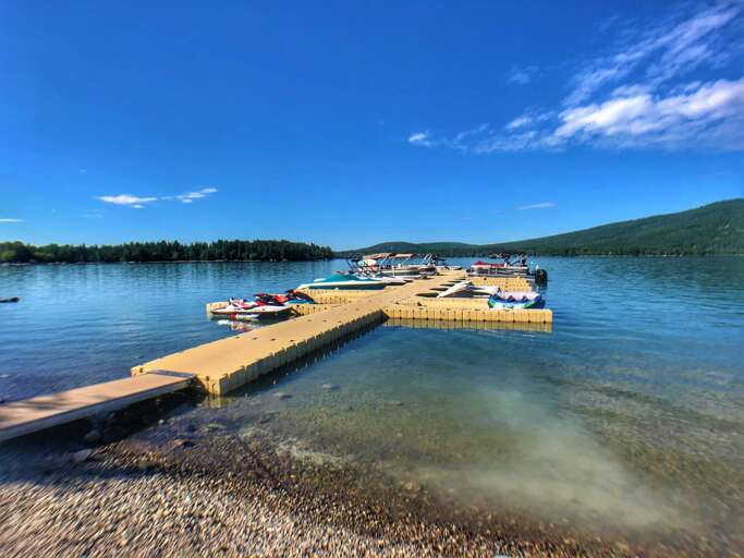 Private beach access to Whitefish Lake with boat slips available upon request (first come first serve basis).