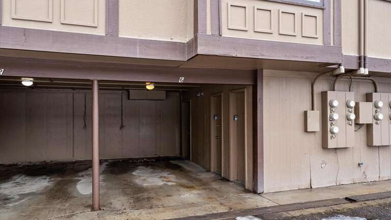 Designated parking space in the carport located on the back side of the building