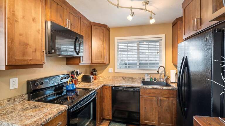 Fully stocked kitchen with all modern appliances