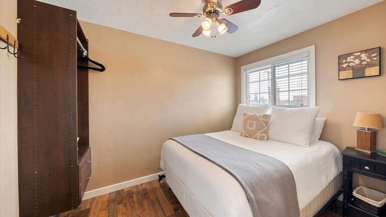 Guest bedroom with luxury mattress and linens