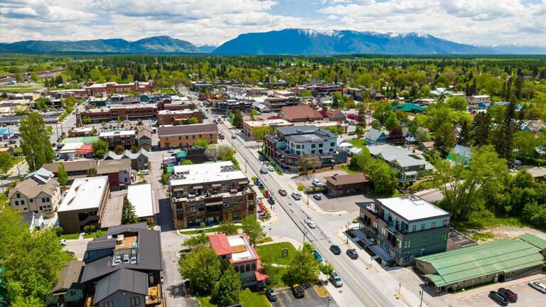 Aerial view of the building showcasing the location in downtown Whitefish.