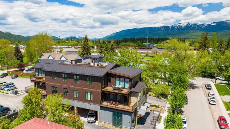 Side aerial view of the building located in the heart of downtown Whitefish.