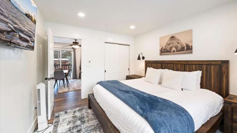 Head upstairs to the master suite. It features electronic blinds, top of the line mattress and luxury linens, HDTV with streaming capabilities, large closet.