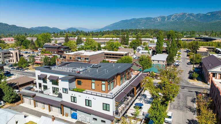 Aerial view of the building showcasing the views of Whitefish Mountain fromt he balcony.