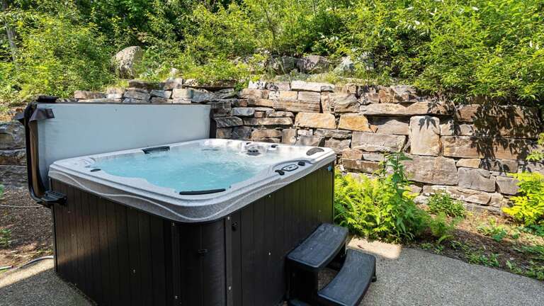 Private hot tub on main floor patio