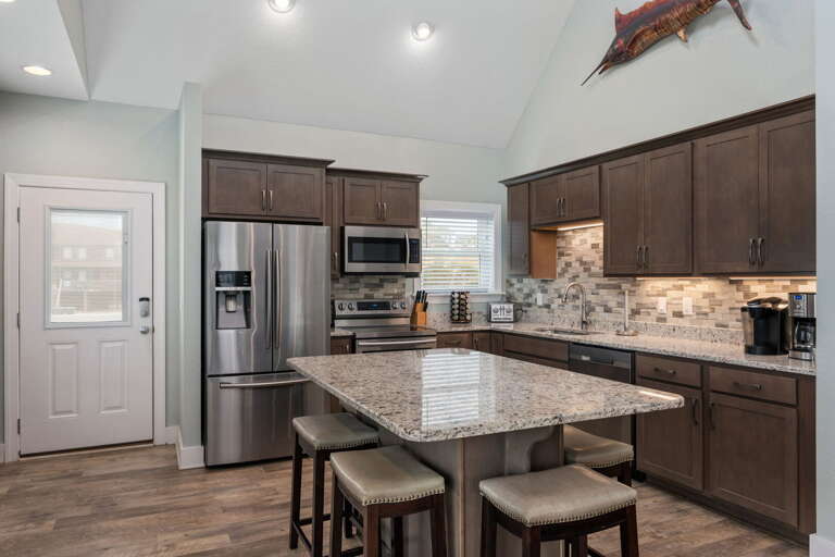 NH387A: Bodie Island Cottage | Kitchen Area- Island Seating for 6