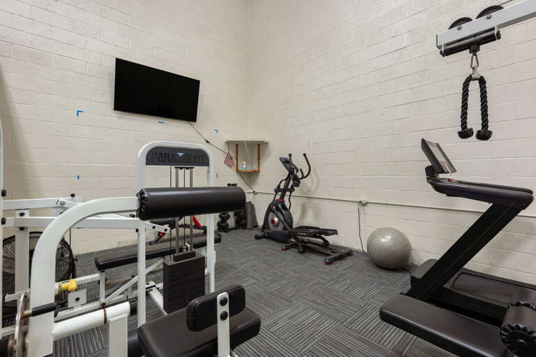 SDG2: Sea Glass Shack | Sea Dunes Community Club House - Fitness Room SDG2: Sea Glass Shack | Sea Dunes Community Club House - Fitness Room