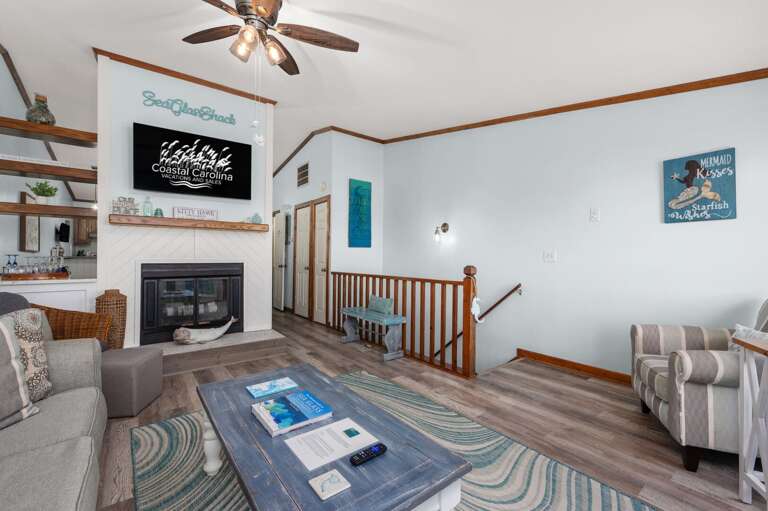 SDG2: Sea Glass Shack | TL Living Area - Sleep Sofa, Deck Access (Fireplace not for guest use) SDG2: Sea Glass Shack | TL Living Area - Sleep Sofa, Deck Access (Fireplace not for guest use)