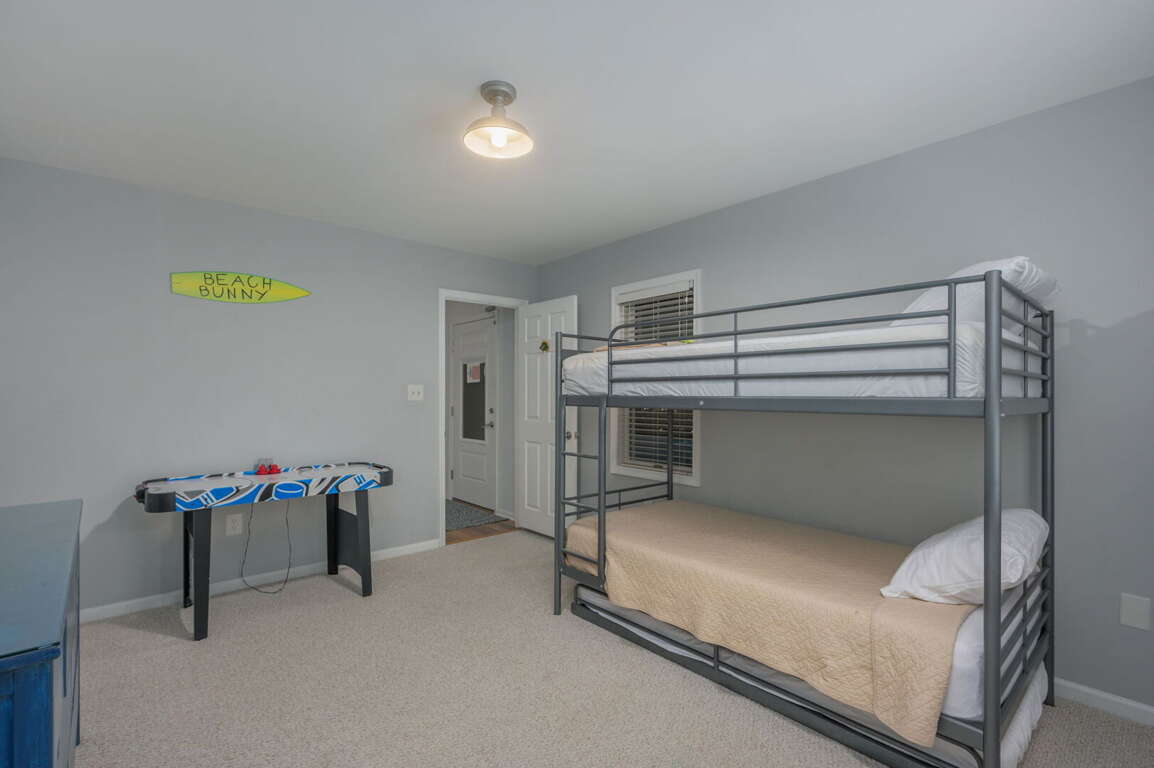 NH501: Calypso's Cove | LL Bedroom 1 - Bunk Bed, Air Hockey Table NH501: Calypso's Cove | LL Bedroom 1 - Bunk Bed, Air Hockey Table