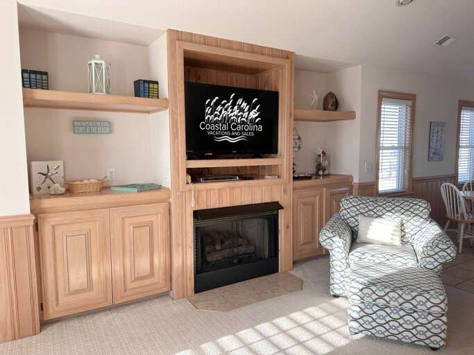 KDH472: Sebastian by the Sea | TL Living Area - Deck Access (Fireplace not for guest use.)